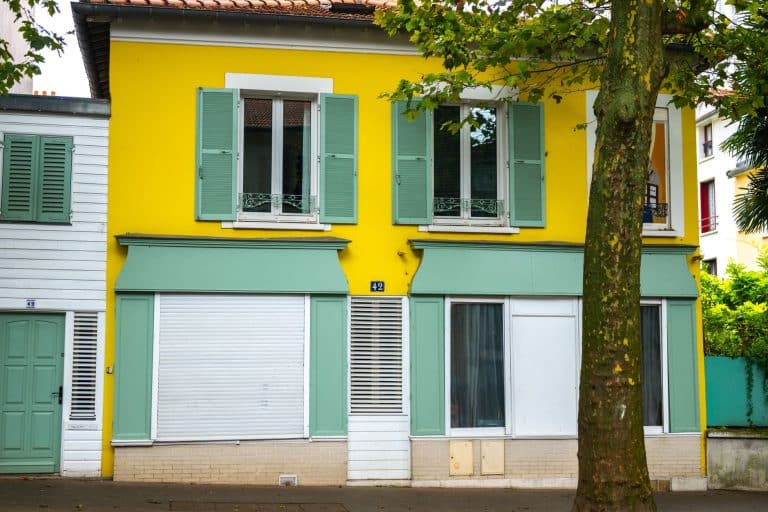 Couleur façade maison beige avec volets anthracite en 2026